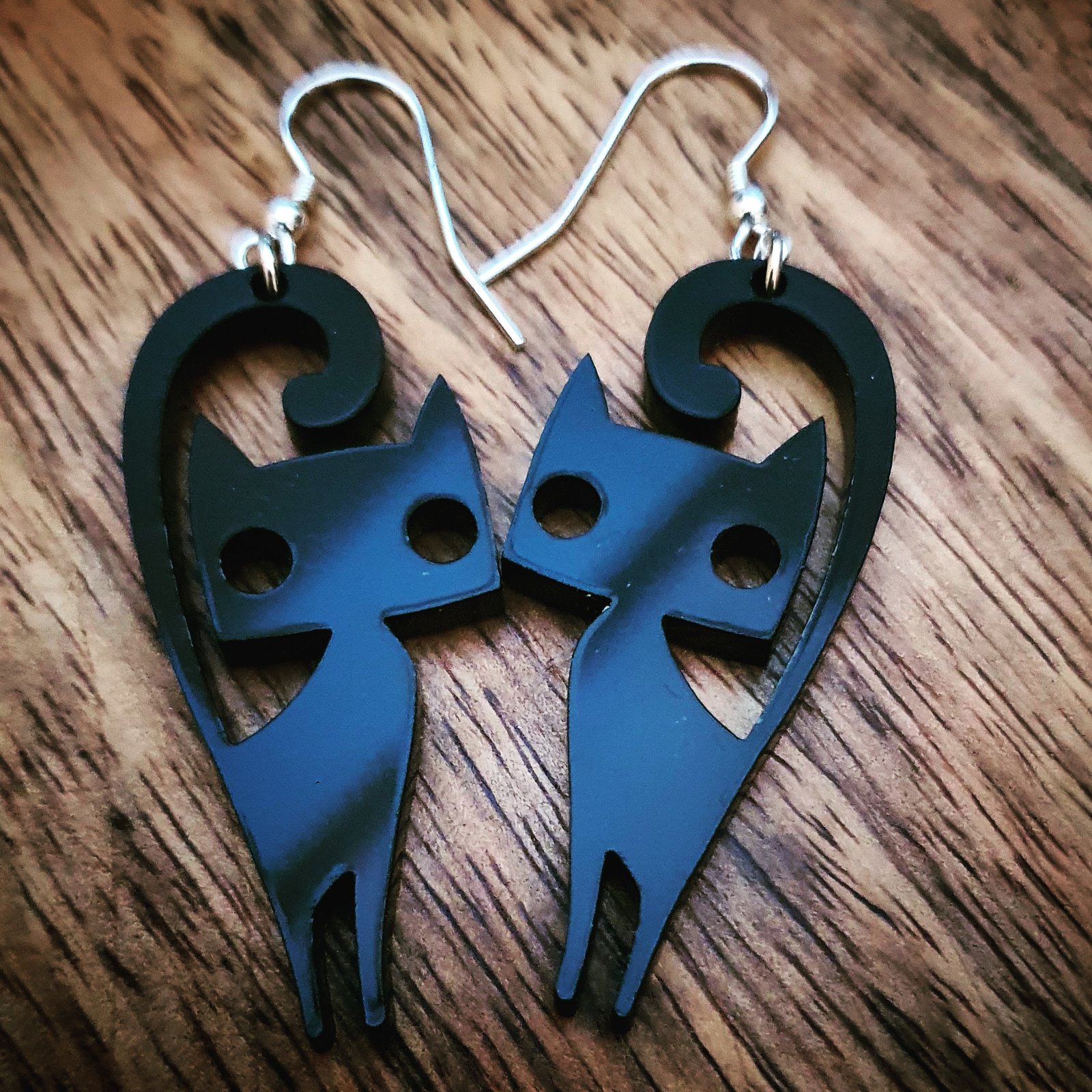 Handmade sterling silver earrings with laser cut acrylic cat design